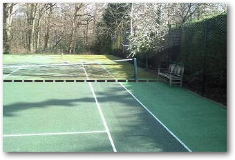 Tennis court showing results after partial cleaning
